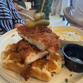 Sunny's at The RIM - Chicken and waffles with the sauce on the side - Breakfast & Brunch Near Me - San Antonio, Texas Sunny's at The RIM - Chicken and waffles with the sauce on the side - Breakfast & Brunch Near Me - San Antonio, Texas