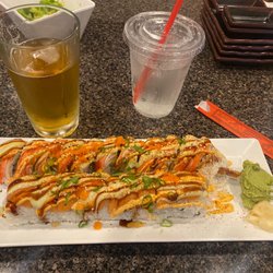 Gogo Sushi Express & Grill - Spicy cowboy and todays special crunchy salmon with a Sapporo !