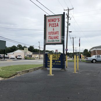 Nino's Pizza - a sign in a parking lot - Pizza Near Me - Callao, Virginia