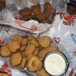 Hook & Reel Cajun Seafood & Bar - Fried pickles and jalapeño poppers.