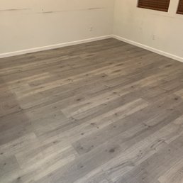 Living room area after vinyl flooring installation. Living room area after vinyl flooring installation.