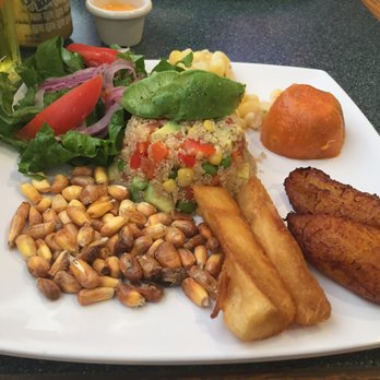 Lima Criolla Peruvian Restaurant - Vegetarian platter - with toasted corn, fried yucca and plantain, sweet potato, hominy, quinoa salad. - Latin American Near Me - Austin, Texas