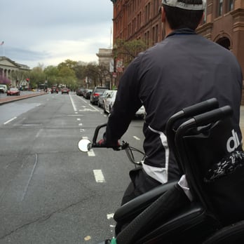 Nonpartisan Pedicab - Alex at the helm with my moms wheelchair safely secured. - Tours Near Me - Washington, DC, District of Columbia Nonpartisan Pedicab - Alex at the helm with my moms wheelchair safely secured. - Tours Near Me - Washington, DC, District of Columbia