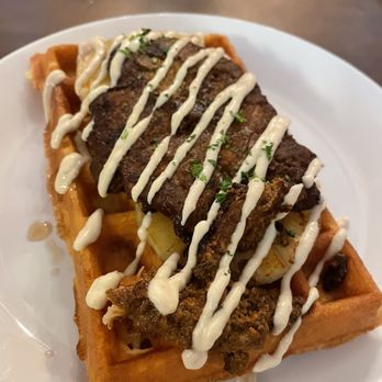 Jasper's Wafflato - Jerk Chicken Waffle, has a bit of kick and so good! the pineapple was a surprise but works well with the flavors. - Juice Bars & Smoothies Near Me - Jasper, Alberta