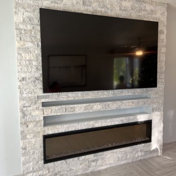 A&J Handyman - Build in fire pace n tv with stones - Painters Near Me A&J Handyman - Build in fire pace n tv with stones - Painters Near Me