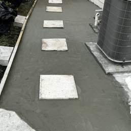Cementing a paved path to the front yard