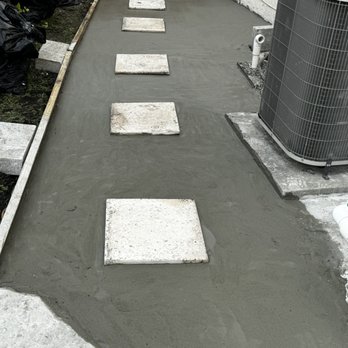 Galvanpro Home Services - Cementing a paved path to the front yard - Handyman Near Me
