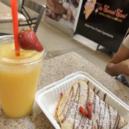 32 oz. Mango Lemonade + Strawberry Nutella Crepe 32 oz. Mango Lemonade + Strawberry Nutella Crepe