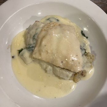 Terry & Maxine's - Haddock with Alfredo sauce, spinach over mashed potatoes - New American Near Me - Turner, Maine