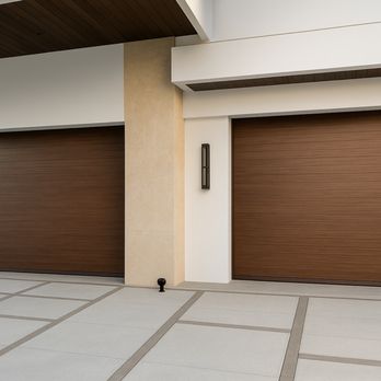 All American Garage Doors - Modern wood-look garage door installation for a residential garage door project by All American Doors in South Florida. - Garage Door Services Near Me - Miami, Florida All American Garage Doors - Modern wood-look garage door installation for a residential garage door project by All American Doors in South Florida. - Garage Door Services Near Me - Miami, Florida