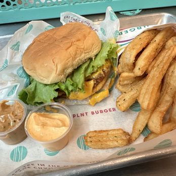 PLNT Burger - PLNT Cheeseburger & Crispy Herb Fries with PLNT and spicy sauces. - Vegan Near Me - New York, New York PLNT Burger - PLNT Cheeseburger & Crispy Herb Fries with PLNT and spicy sauces. - Vegan Near Me - New York, New York