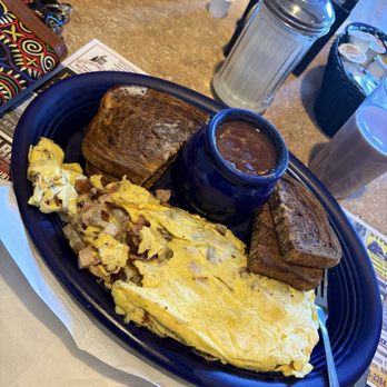 The Farmer's Kitchen - Meat lovers omelette, rye toast, and beans - American Near Me - Farmington, New Hampshire