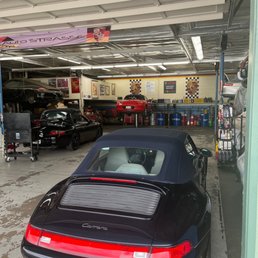 Boxster being looked at for oil leak and paint inspection among other things. Boxster being looked at for oil leak and paint inspection among other things.