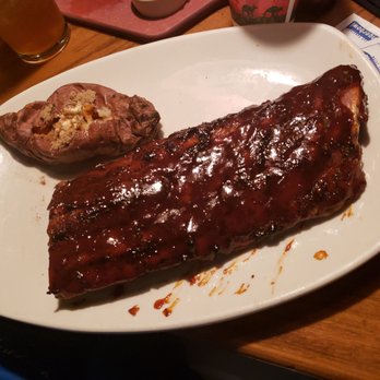 Outback Steakhouse - Ribs and sweet potato.....she had a salad as well lol - Steakhouses Near Me - Poway, California Outback Steakhouse - Ribs and sweet potato.....she had a salad as well lol - Steakhouses Near Me - Poway, California