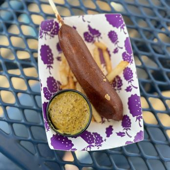 Strictly On A Stick - Boysenberry corn dog comes with seasoned fries (I ate most of them)and boysenberry mustard (I have a jar of this at home). - American Near Me - Buena Park, California Strictly On A Stick - Boysenberry corn dog comes with seasoned fries (I ate most of them)and boysenberry mustard (I have a jar of this at home). - American Near Me - Buena Park, California