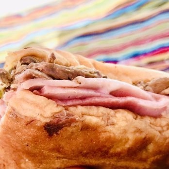 Havana Dreamers Cafe - Tampa Cuban Sandwich on Media Noche Bread (A touch of sweet bread compared to the Cuban bread) so good! - Cuban Near Me - Trinity, Florida Havana Dreamers Cafe - Tampa Cuban Sandwich on Media Noche Bread (A touch of sweet bread compared to the Cuban bread) so good! - Cuban Near Me - Trinity, Florida