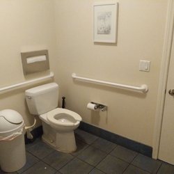 The Massage Place - View of restroom and restroom door.