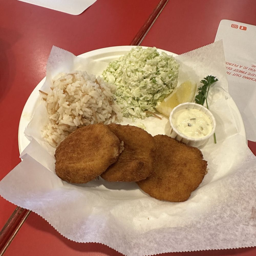 The Crab Cooker - Crab cakes with rice pilaf and Cole slaw - IG @bougiefoodieboi - Seafood Near Me - Tustin, California The Crab Cooker - Crab cakes with rice pilaf and Cole slaw - IG @bougiefoodieboi - Seafood Near Me - Tustin, California