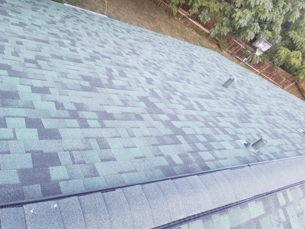 Slide of Monumental Roofing Services