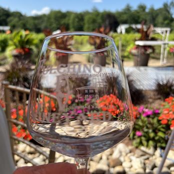 Fulchino Vineyard - a hand holding a wine glass - Wineries Near Me - Hollis, New Hampshire Fulchino Vineyard - a hand holding a wine glass - Wineries Near Me - Hollis, New Hampshire