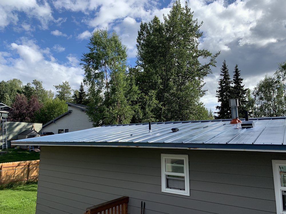 Slide of Over the Top Roofing LLC