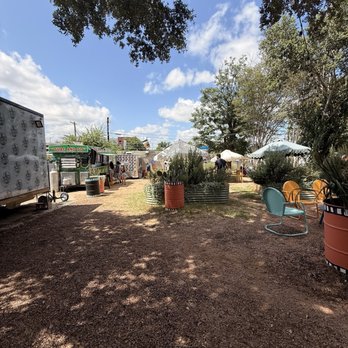 A Hole Coffee - Back of the shop were other food trucks are located with seating area - Food Trucks Near Me - Austin, Texas A Hole Coffee - Back of the shop were other food trucks are located with seating area - Food Trucks Near Me - Austin, Texas
