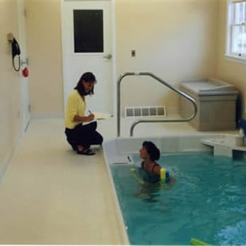 Orthopedic& Spine Physical Therapy - Denise Didio Buher, PT, DPT working with a patient in our pool - Physical Therapy Near Me - Queensbury, New York Orthopedic& Spine Physical Therapy - Denise Didio Buher, PT, DPT working with a patient in our pool - Physical Therapy Near Me - Queensbury, New York