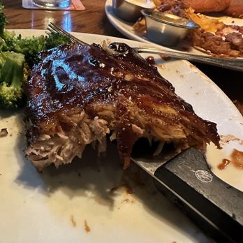 Outback Steakhouse - Normally never have an issue here but todays ribs had no meat on them and the broccoli was really crunchy. - Steakhouses Near Me - Irving, Texas