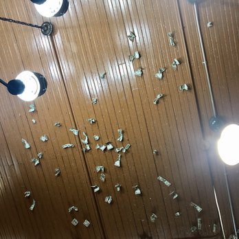Puempel's Olde Tavern - Money tacked to the tall ceiling. - Bars Near Me - New Glarus, Wisconsin