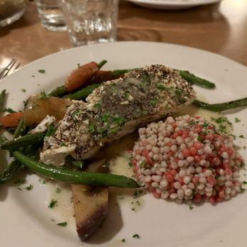 Silverwater Cafe - Almond Sumac Halibut Wild Alaskan halibut encrusted with crushed almonds and bright + tangy sumac, couscous and seasonal vegetables. - Seafood Near Me - Port Townsend, Washington
