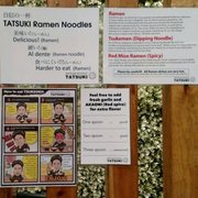 Photo of Artisan Noodle Tatsuki - San Diego, CA, United States. Signs posted on the pillars and walls