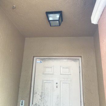 Resilient Tech Services - Installed light fixture. Notice how filthy the door is in this picture  . - Handyman Near Me
