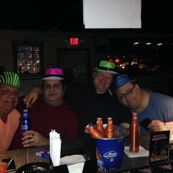 The Parrot - a group of men sitting at a bar - Gay Bars Near Me - Lakeland, Florida The Parrot - a group of men sitting at a bar - Gay Bars Near Me - Lakeland, Florida