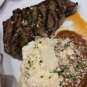 Mamma Mia - Ribeye with half and half pasta, not a fan of capers but tried anyway, still not a fan but the bolognese sauce was remarkable. - Italian Near Me - Bakersfield, California Mamma Mia - Ribeye with half and half pasta, not a fan of capers but tried anyway, still not a fan but the bolognese sauce was remarkable. - Italian Near Me - Bakersfield, California