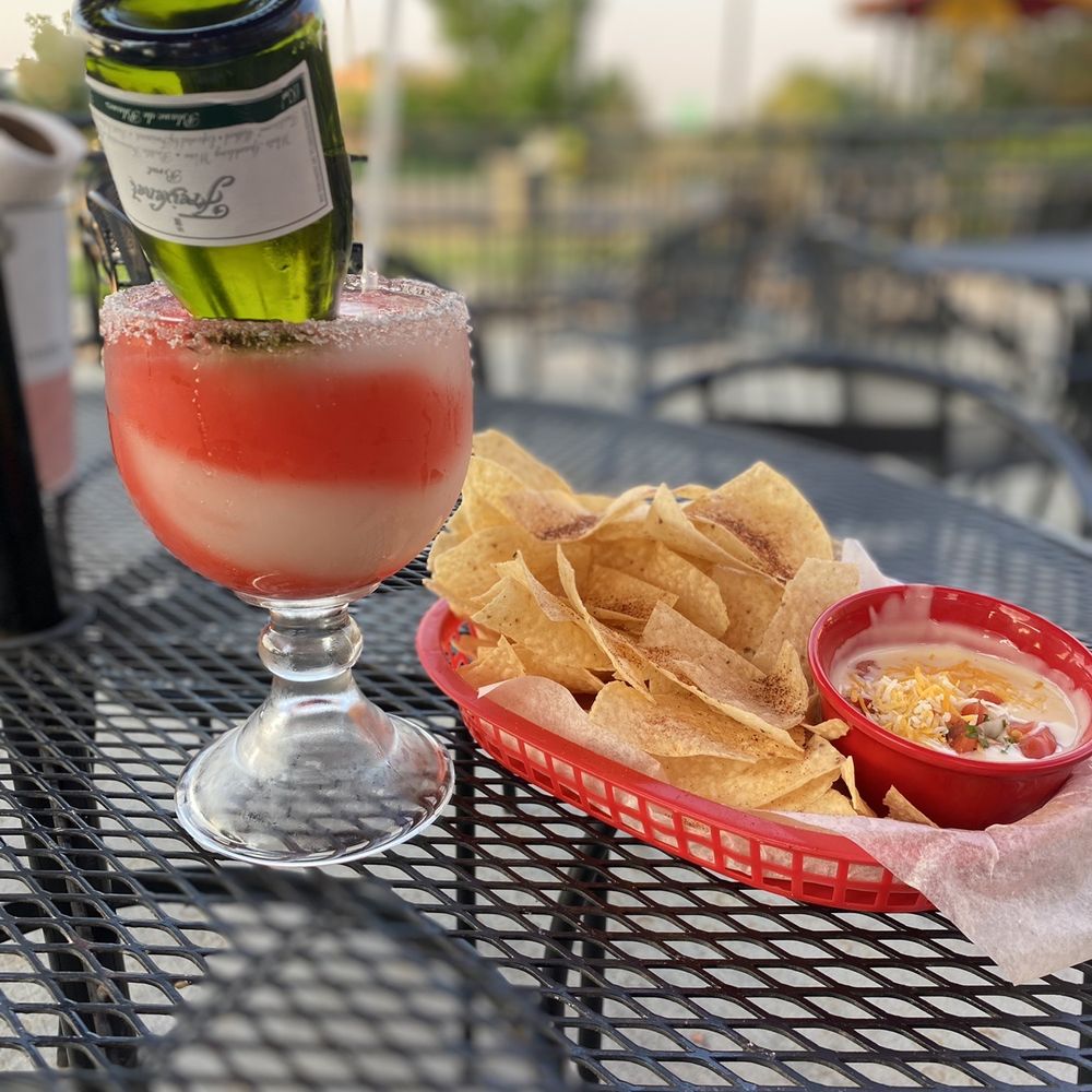 Fuzzy's Taco Shop - "1800 somewhere" frozen drink with champagne Chips & Queso - Mexican Near Me - Fort Collins, Colorado Fuzzy's Taco Shop - "1800 somewhere" frozen drink with champagne Chips & Queso - Mexican Near Me - Fort Collins, Colorado