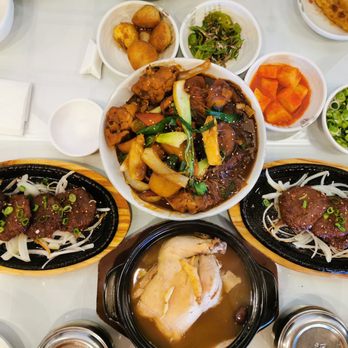 Ssyal - a variety of dishes of food on a table - Korean Near Me - Chicago, Illinois Ssyal - a variety of dishes of food on a table - Korean Near Me - Chicago, Illinois