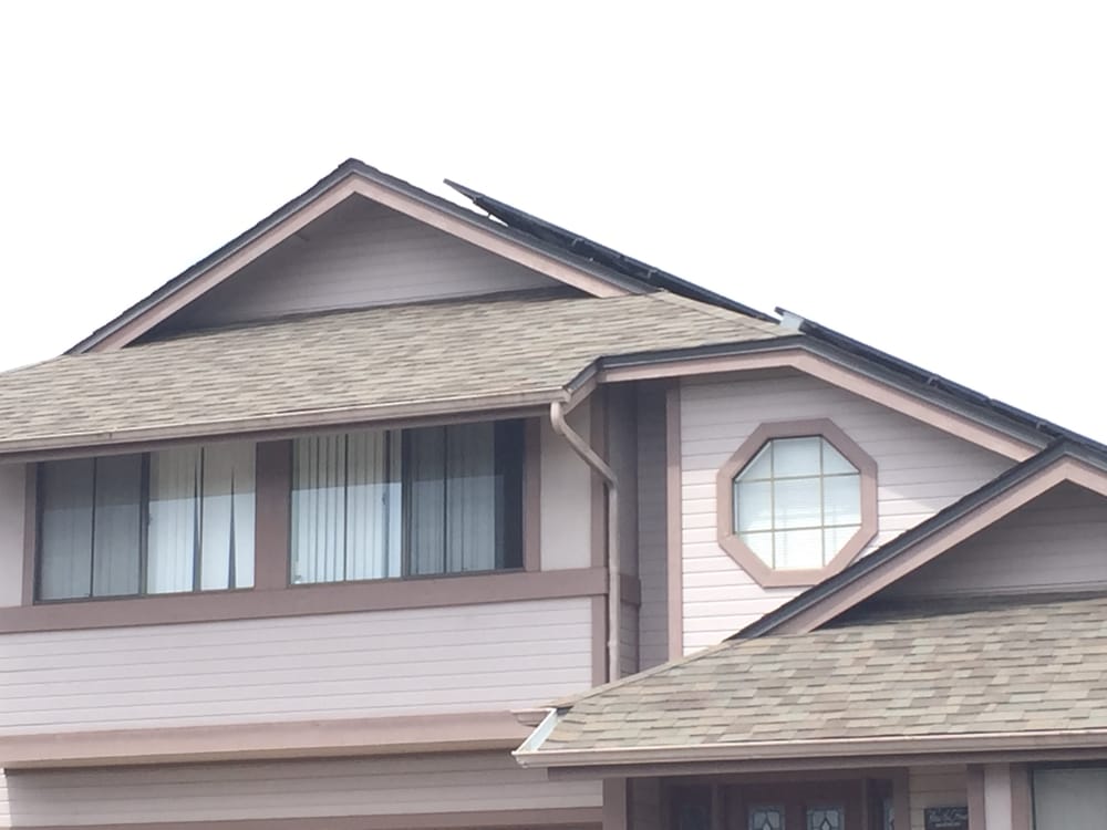 Slide of Discovery Roofing