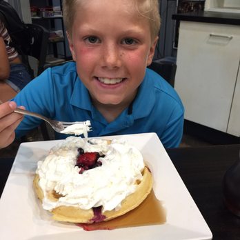 The Buzz Coffee & Cafe - Clark trying a four berry waffle - Coffee & Tea Near Me - Burnsville, Minnesota The Buzz Coffee & Cafe - Clark trying a four berry waffle - Coffee & Tea Near Me - Burnsville, Minnesota