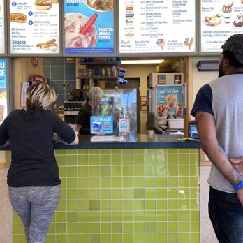 Dairy Queen Ltd Brazier - a woman and a man standing in front of a counter - Fast Food Near Me - Kenosha, Wisconsin