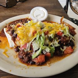 Jax In and Out Enchirito - Huge marriage of an enchilada and beef burrito in a mildly spicy flavorful chile sauce.
