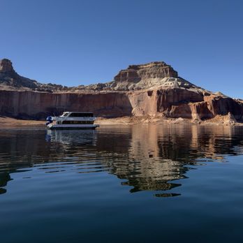 Lake Powell Resort and Marinas - Taken from the smaller speed boat, while I pull into Gunsight Bay to beach the boat and secure the lines - Hotels Near Me - Page, Arizona Lake Powell Resort and Marinas - Taken from the smaller speed boat, while I pull into Gunsight Bay to beach the boat and secure the lines - Hotels Near Me - Page, Arizona