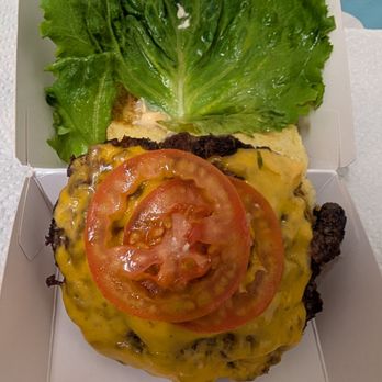 Shake Shack - Cheeseburger with sauce, lettuce, and tomato. - Burgers Near Me - Los Angeles, California Shake Shack - Cheeseburger with sauce, lettuce, and tomato. - Burgers Near Me - Los Angeles, California