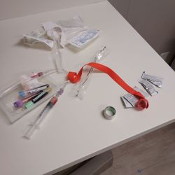 Trinitas Regional Medical Center - Bloody vials and syringe left out.