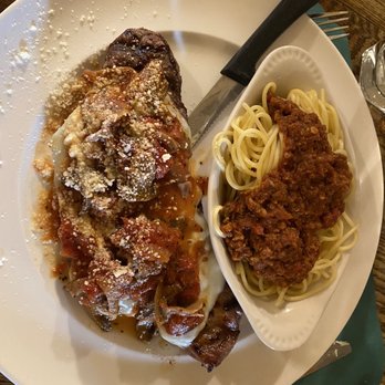 Teresa's Place - Bistecca Alla Teresa - New York Strip Steak with melted mozzarella and a topping of onions, mushrooms, and tomatoes. A side of spaghetti. - Italian Near Me - Jackson, California Teresa's Place - Bistecca Alla Teresa - New York Strip Steak with melted mozzarella and a topping of onions, mushrooms, and tomatoes. A side of spaghetti. - Italian Near Me - Jackson, California