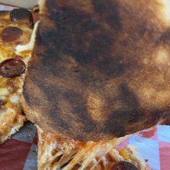 Brick Oven Bistro - Burnt crust...all the slices were like this if not worse. Tasted and smelled burnt! - Pizza Near Me - Buffalo, New York Brick Oven Bistro - Burnt crust...all the slices were like this if not worse. Tasted and smelled burnt! - Pizza Near Me - Buffalo, New York