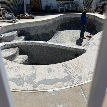 Exclusive Pools - Pool before they started the resurfacing. - Pool & Hot Tub Service Near Me