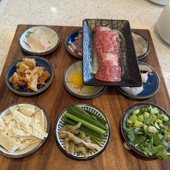 Fiery tomato broth roodle with side of wagyu