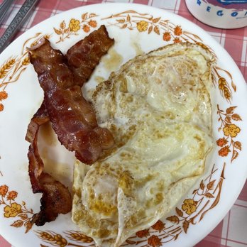 Harry's Café - Banana pancake combo with 2 eggs and choice of bacon or sausage. - Breakfast & Brunch Near Me - Honolulu, Hawaii