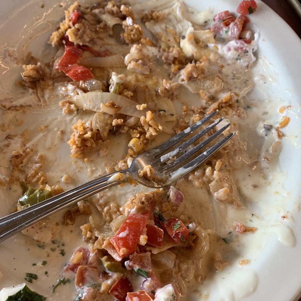 El Columpio - Carnage! What's left of my valiant effort to finish the always delicious Queso Burrito. - Mexican Near Me - Mitchell, South Dakota El Columpio - Carnage! What's left of my valiant effort to finish the always delicious Queso Burrito. - Mexican Near Me - Mitchell, South Dakota