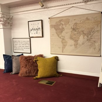 HeBrews 11&1 - a map of the world hanging on a wall - Coffee & Tea Near Me - Hope, Arkansas